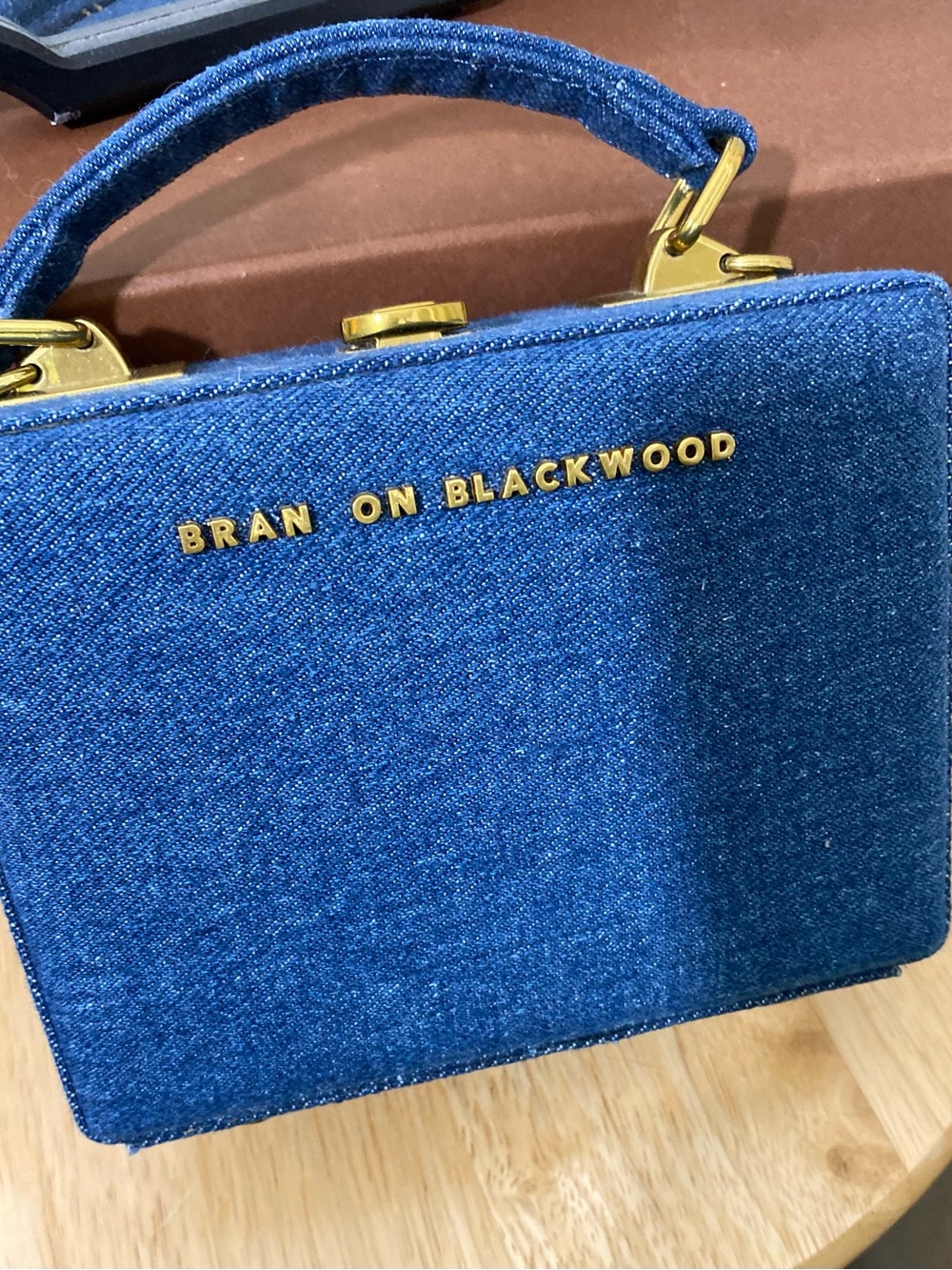 Brandon Blackwood Mini Kendrick Trunk bag in denim.